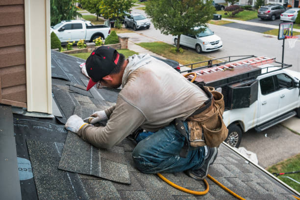 Professional Roofing technician working in Boylston, MA